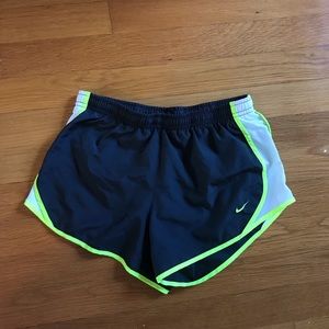 Grey and neon yellow Nike shorts